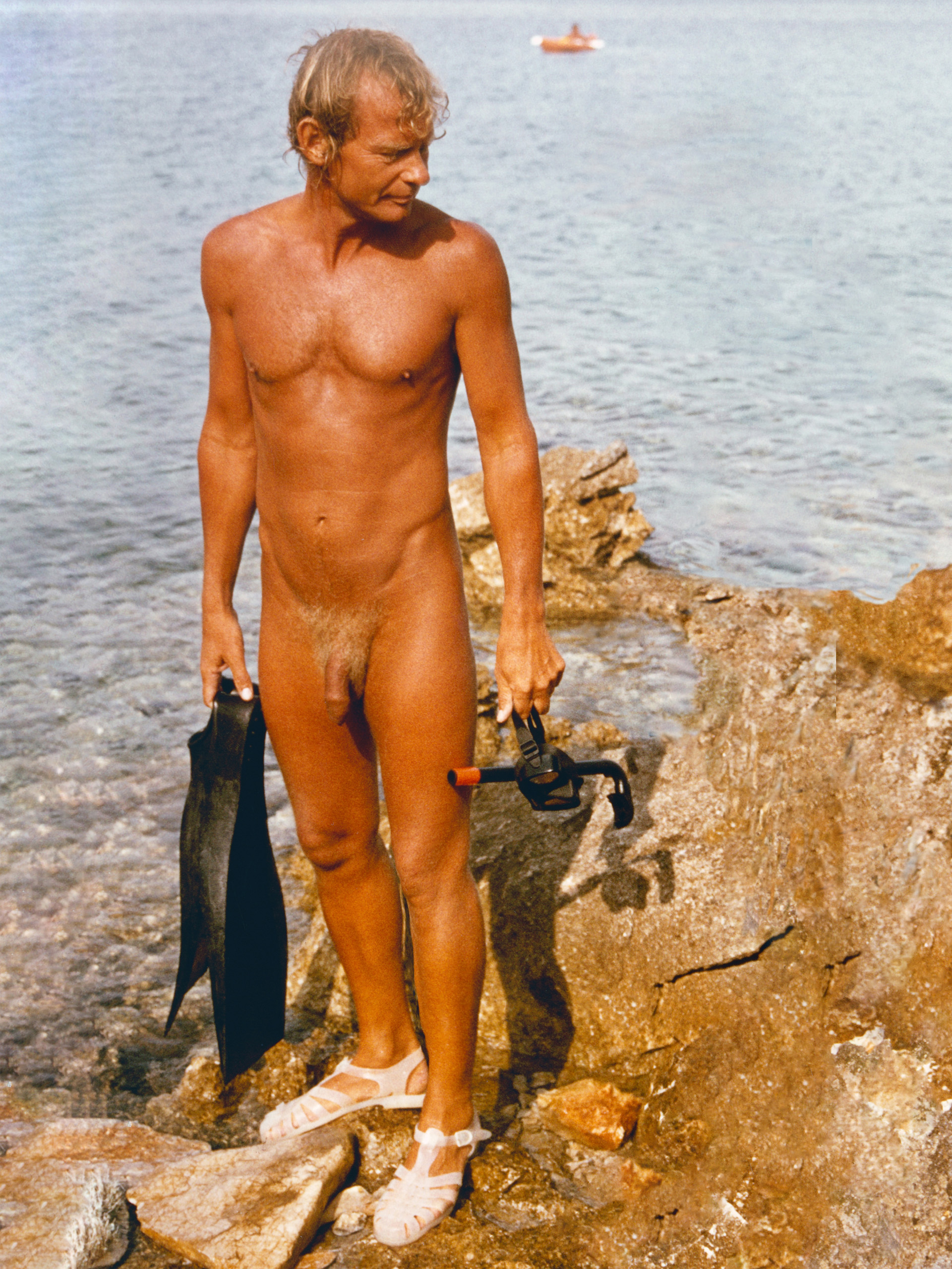 Naked and free - diving on the beach of the naturist camp Baldarin on the island of Cres